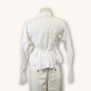 back view of cropped white peplum blouse