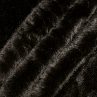 three peaks arranged of a deep brown colored faux fur fabric, showing its thick and plush qualities