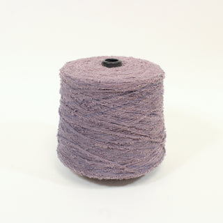 large cone of dusky purple colored eyelash yarn