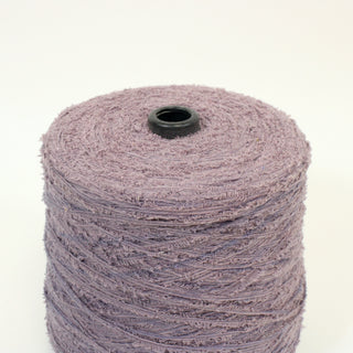close-up of a large cone of dusky purple eyelash yarn