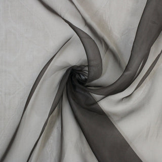 swirl of dusty cocoa organza fabric, showing the stiff draping quality