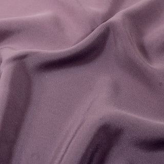close-up of a dusty purple colored silk georgette fabric