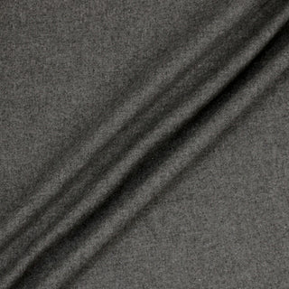 ripple of a medium grey wool-blend felted fabric, showing the structured drape