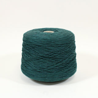 large yarn cone in dark emerald green with sparkles throughout