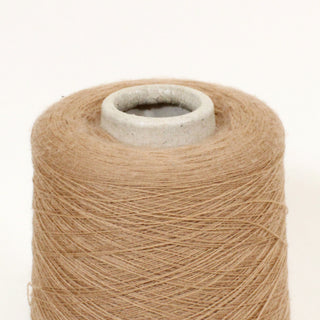 close-up of a small cone of ultra-fine fawn brown colored yarn