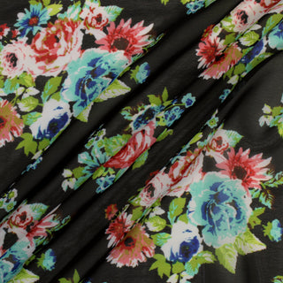 three diagonal lines draped of a black, multicolor floral chiffon fabric