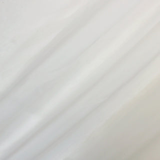 three diagonal lines draped of a frost white silk organza fabric