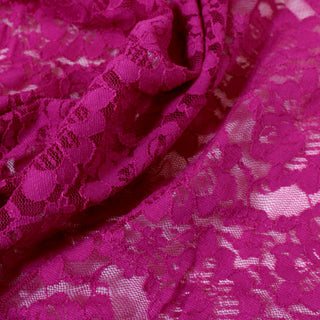 close-up of a pink floral stretch lace mesh fabric, detailing the mesh fabric structure and floral motif