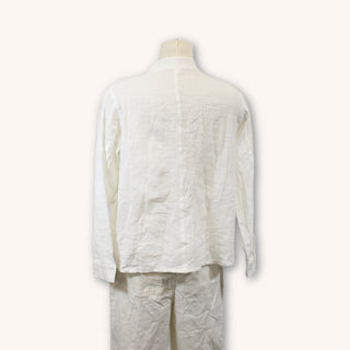 back view of gauzy white button up shirt