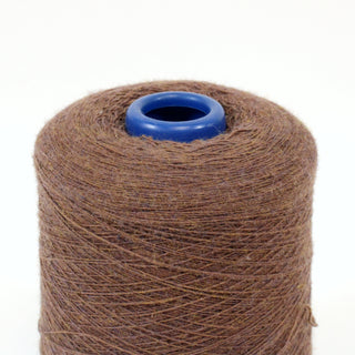 close-up of a cone of fine-gauge worsted wool yarn in a brown color