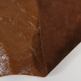 front and back of brown cowhide leather skin, revealing the sueded backside