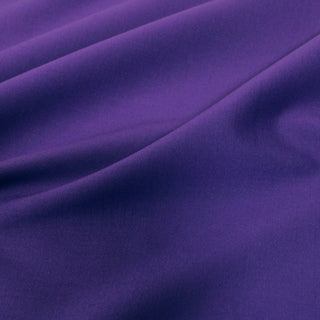 close-up of texture and hand of a grape twill fabric