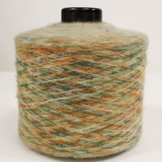 multi-color cone of fine-gauge, mohair yarn, in shades of green and orange