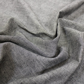close-up of a herringbone twill weave, detailing the surface shine