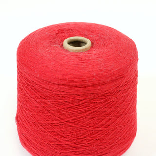 close-up of spool of holly red laceweight yarn