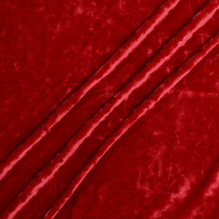 rumpled crushed velvet fabric in holly red color