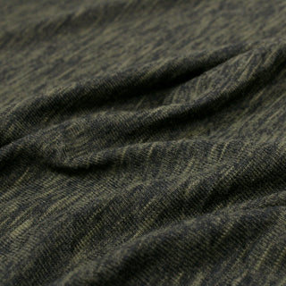 close-up of hunter green heathered jersey fabric, showing hand of fabric and details of the knit structure