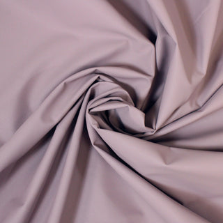 swirl of hyacinth colored textured vinyl fabric