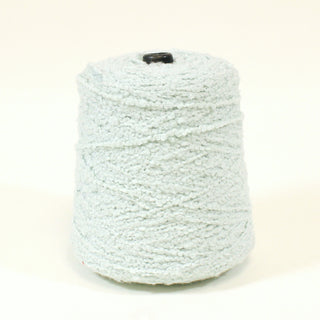 cone of bulky ice blue boucle yarn