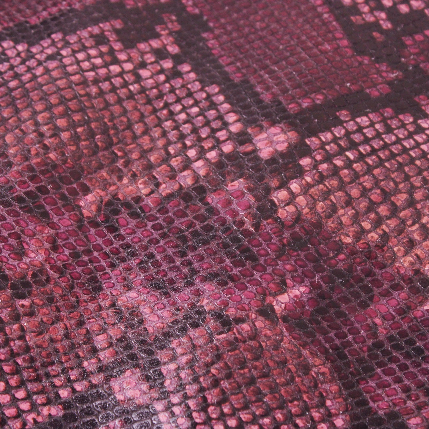 MAGENTA EMBOSSED SNAKE PRINT COW HIDE