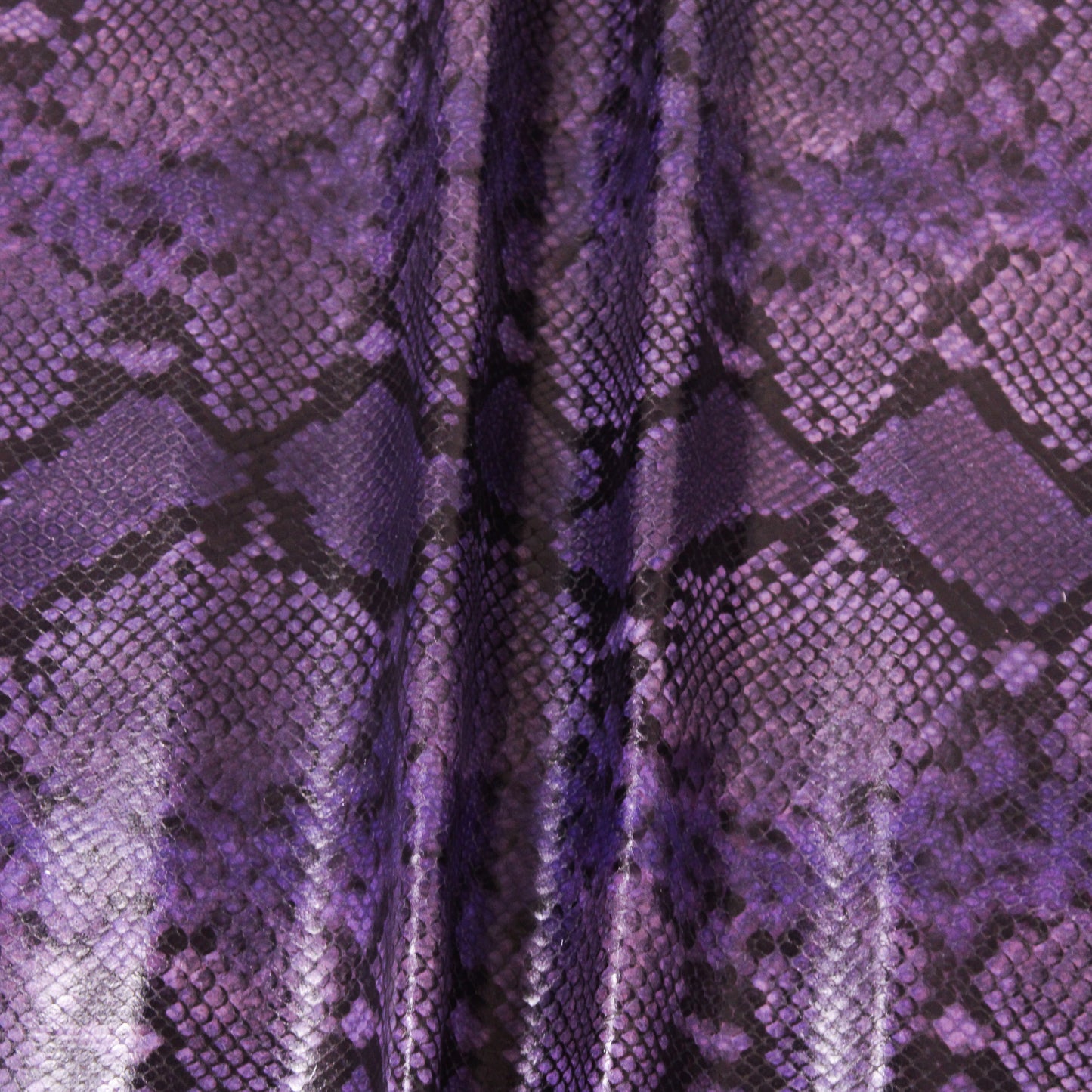 PURPLE EMBOSSED SNAKE PRINT COW HIDE