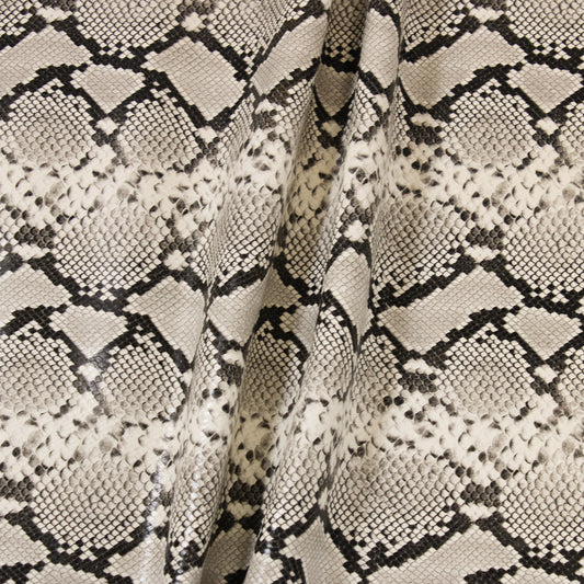 CREAM EMBOSSED SNAKE PRINT COW HIDE