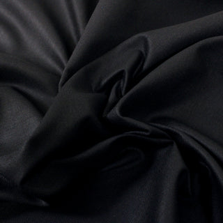 close-up of dark indigo silk twill fabric
