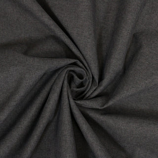 swirl of iron grey brushed tweed upholstery fabric demonstrating the hand of the fabric