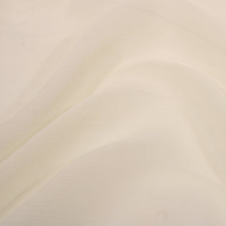 close-up of ivory colored crinkle chiffon fabric, detailing the crinkle texture