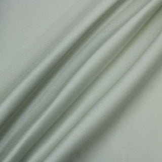 three diagonal lines arranged with jade green twill fabric, showing its structured hand and subtle surface sheen