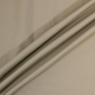 rumpled khaki chino fabric, demonstrating the structured drape