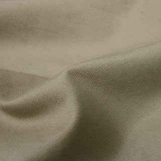close-up of khaki chino fabric, detailing the twill weave