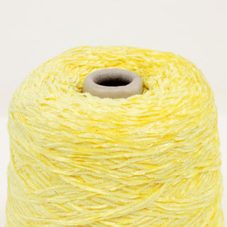 close-up of a cone of chenille yarn in lemon yellow color