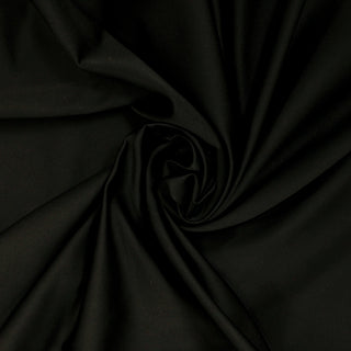 swirl of black satin fabric