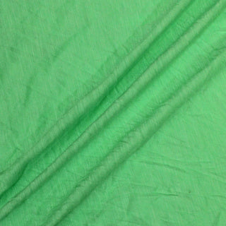 three diagonal lines arranged of bright, heathered, lizard green jersey fabric, showing its lightweight and stretchy hand