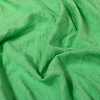 close-up of lizard green heathered jersey fabric