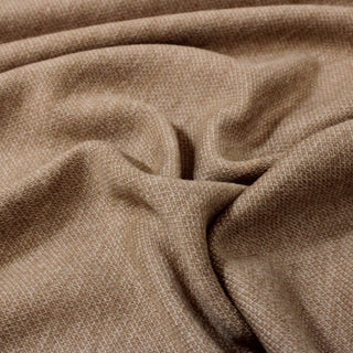 close-up of luxe knit camel jersey fabric, showing the two-toned stitching and soft face