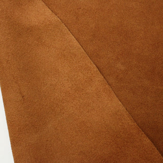 front and back of a cowhide suede piece in a rich maple color