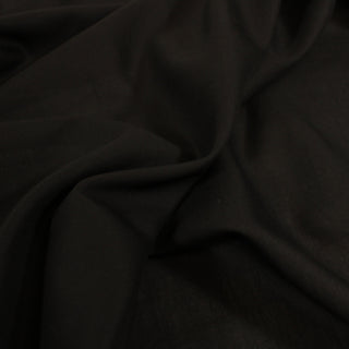 ruffle of black matte crepe fabric