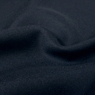close-up of midnight wool felt, showing fabric texture and hand