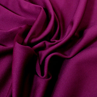 close-up of a mulberry colored tricot knit fabric