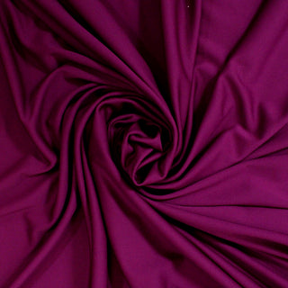 swirl of mulberry colored tricot knit fabric