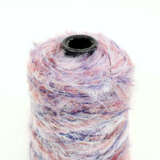 close-up of a small cone of multicolor fine-gauge eyelash yarn