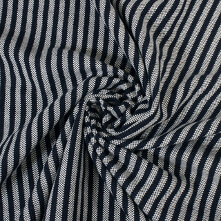 swirl of navy and white striped basketweave fabric