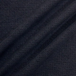 navy colored woven-diamond upholstery fabric with three diagonal lines arranged across it to show the heavyweight drape