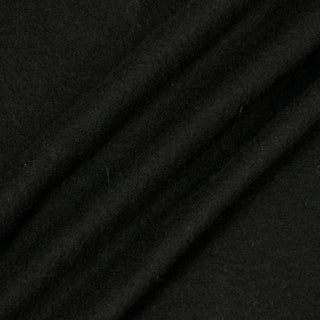 black colored boiled wool fabric scrunched up to show drape