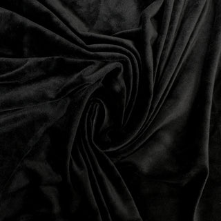 swirl of a black velour fabric