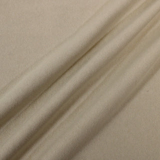 three diagonal lines arranged on a piece of oatmeal colored french terry fabric, demonstrating the heavy hand