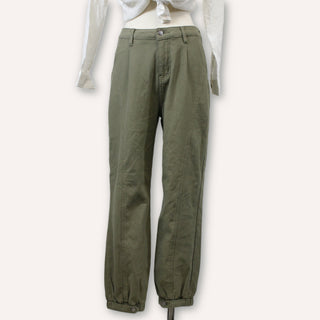 front view of olive green pants on a mannequin