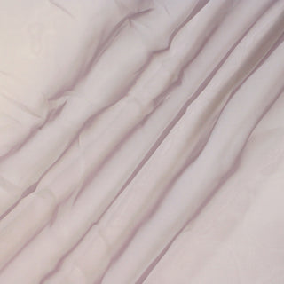 three diagonal lines arranged with orchid colored silk organza fabric, demonstrating the structured and transparent hand of the fabric